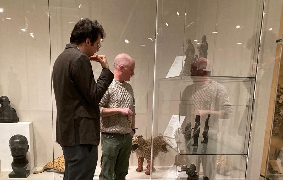 Benjamin Anderson and Jakub Koguciuk viewing display cases